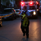 Police expand the crime scene in the 3900 block of West Lexington Street, where a 20-year-old woman suffered a gunshot wound to the head, in Chicago on May 28, 2016.
E. Jason Wambsgans/Chicago Tribune/TNS via Getty Images